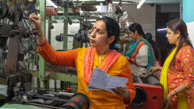 Fashion designer sketching clothes