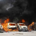 Noida labour protest workers demanding wage hike blocking road