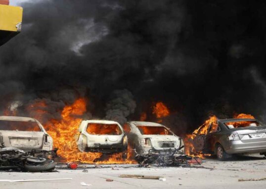 Noida labour protest workers demanding wage hike blocking road
