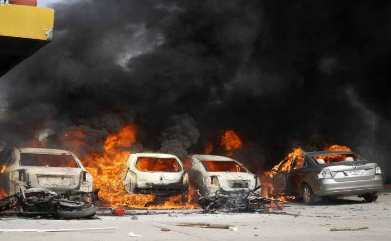 Noida labour protest workers demanding wage hike blocking road